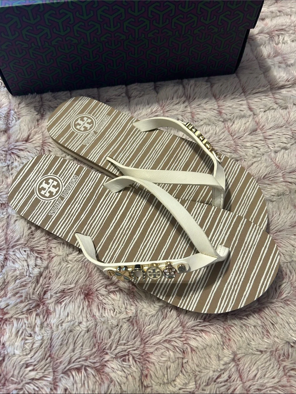 Tory Burch White Strap Striped Footbed Flip Flops with Gold Logo Charms size 9